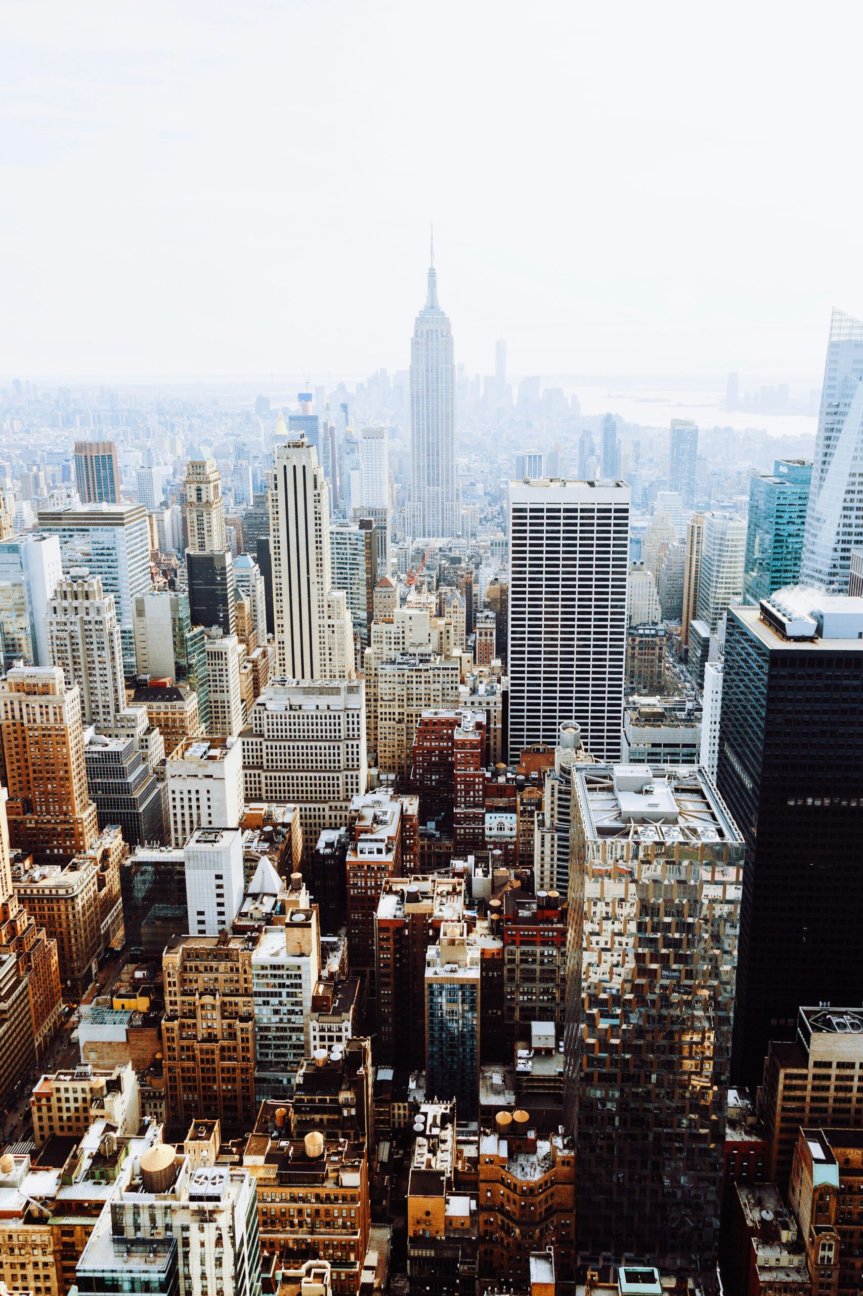 Aerial view of skycrapers in a heavy city settling, links to Go City Pass website